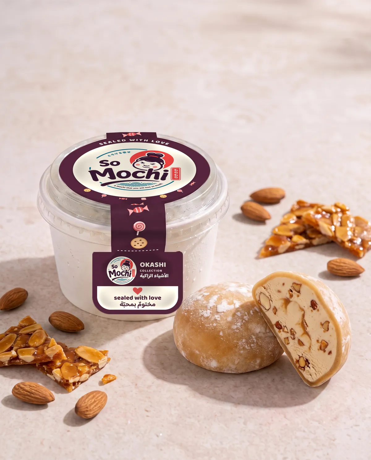 Jumbo Crocan mochi, whole and cut open, beside its sealed So Mochi cup