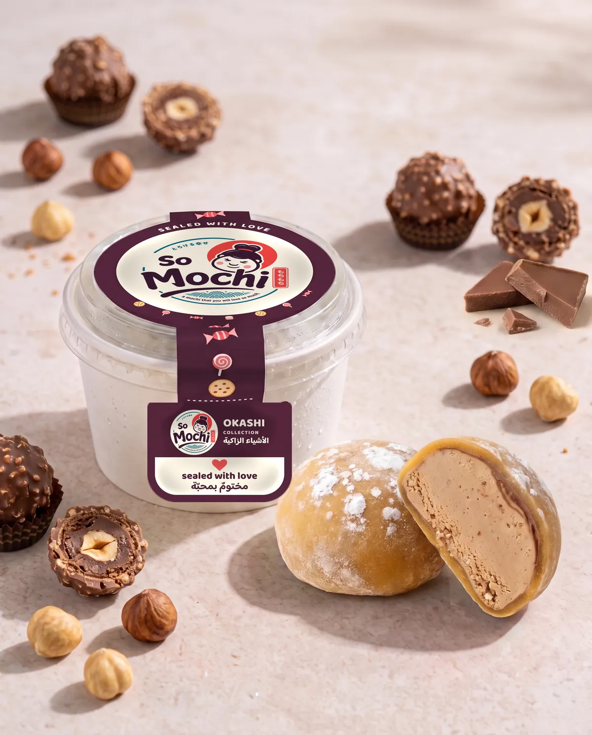 Jumbo Ferrero Rocher mochi, whole and cut open, beside its sealed So Mochi cup